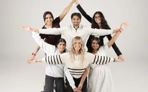 Members of the South Asian Student Union strike a fun post in the photo studio.