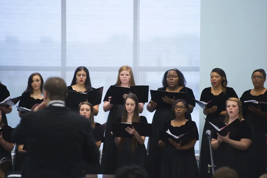 Group of USI Chamber Choir students perform in the David L. Rice Library
