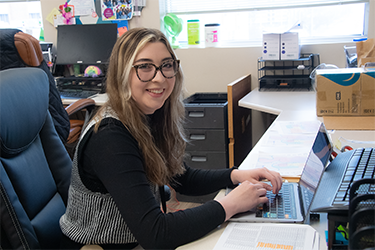 Lauren Blank at her desk