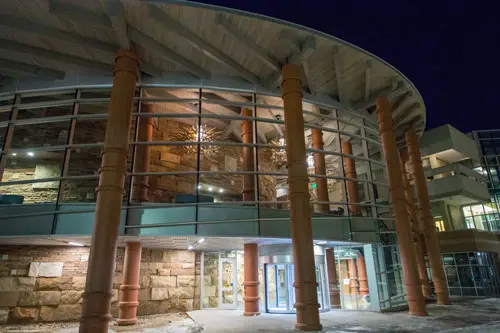 Exterior view of the Performance Center building at night