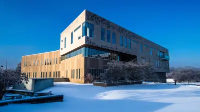 Exterior view of the Business and Engineering Center on a snowy day