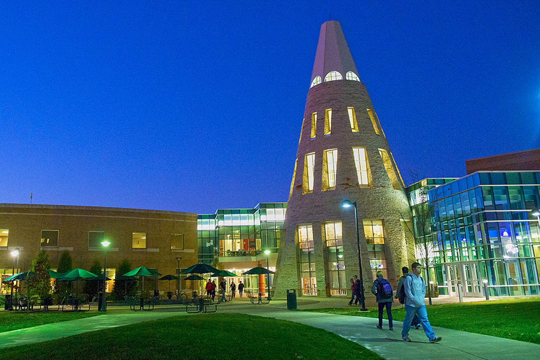 Photo of University at Night with Cone lit up