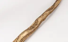 tattooed wood art piece