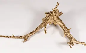 tattooed wood art piece