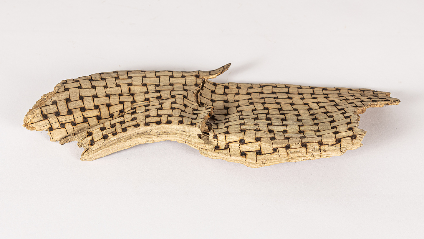 tattooed wood art piece