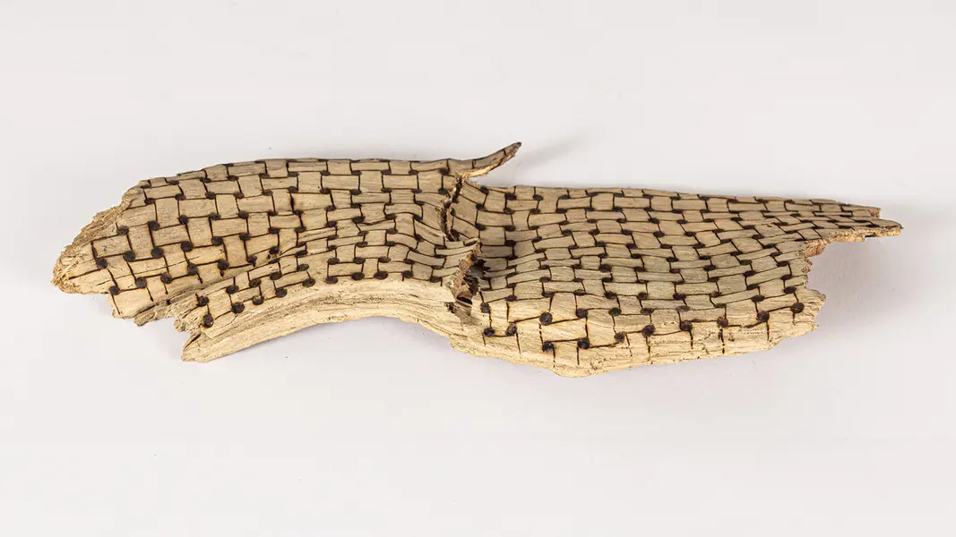 tattooed wood art piece