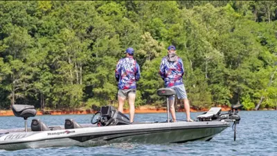 Two Members of the club fishing at an event