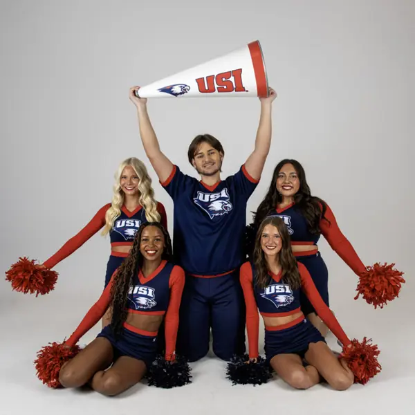Members of USI's Cheer Team posing together for their media day photos. 